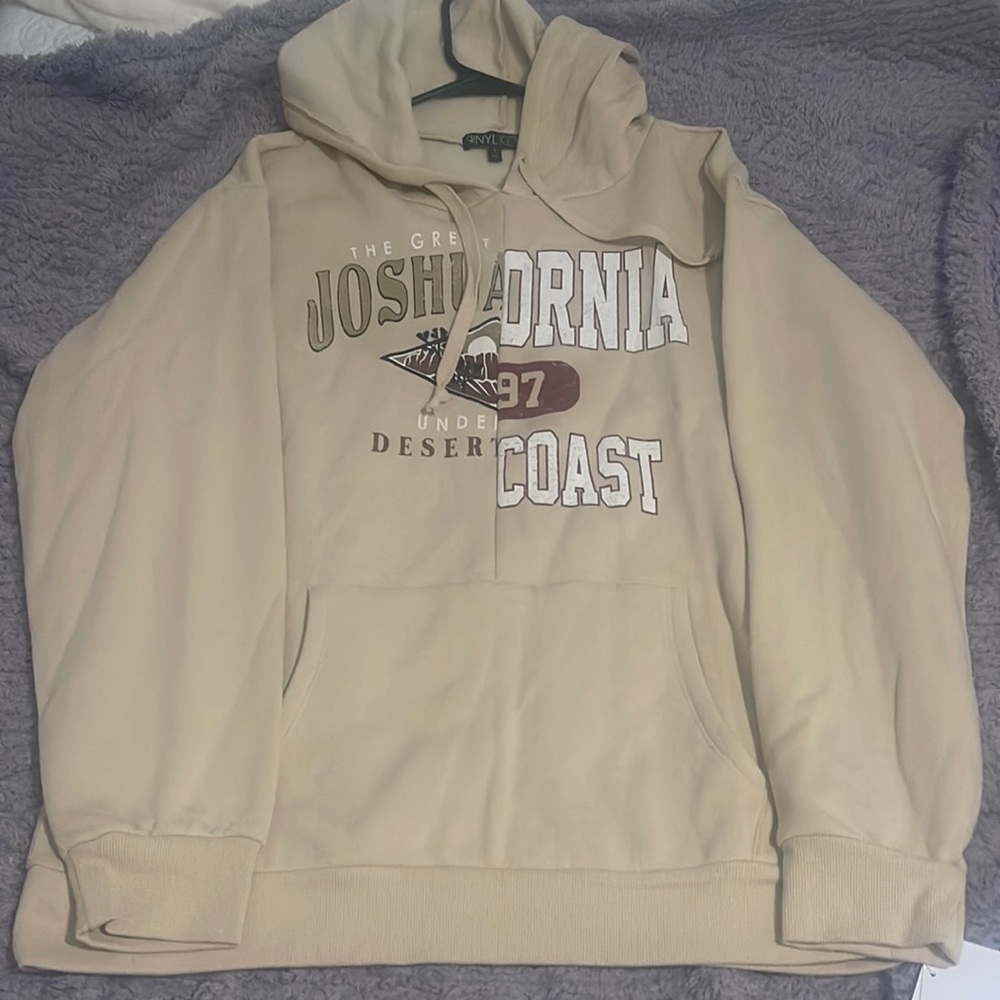 Women’s beige hoodie, brand new.